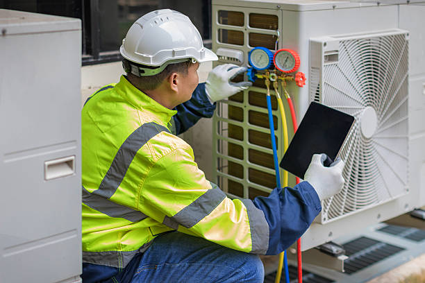 Professional Heat Pump Repair technician working in Marshfield, MO